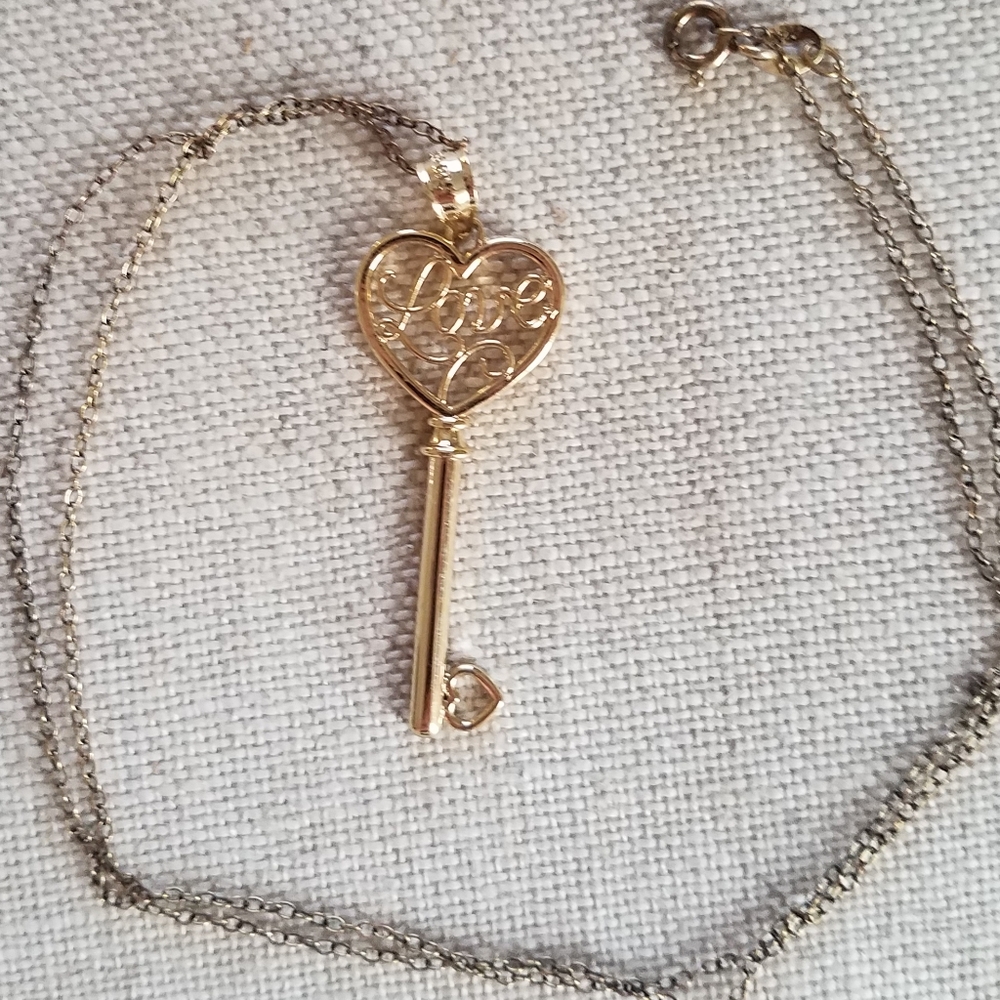 Gold colored cute heart key necklace